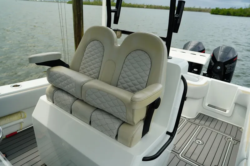  Yacht Photos Pics 2023 Andros 32 Offshore boat with luxurious seating and dual outboard motors.