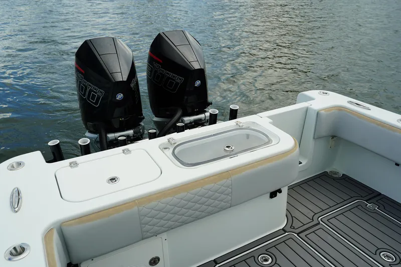  Yacht Photos Pics 2023 Andros 32 Offshore boat with dual outboard motors on water.