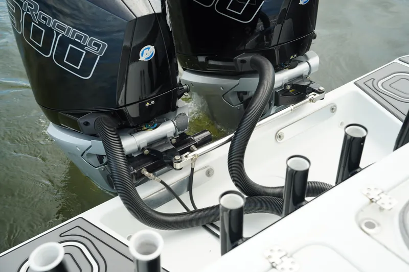  Yacht Photos Pics Twin outboard engines on a 2023 Andros 32 Offshore boat, featuring sleek design and advanced technology.