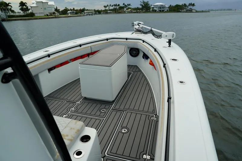  Yacht Photos Pics 2023 Andros 32 Offshore boat with sleek deck design on calm waters.