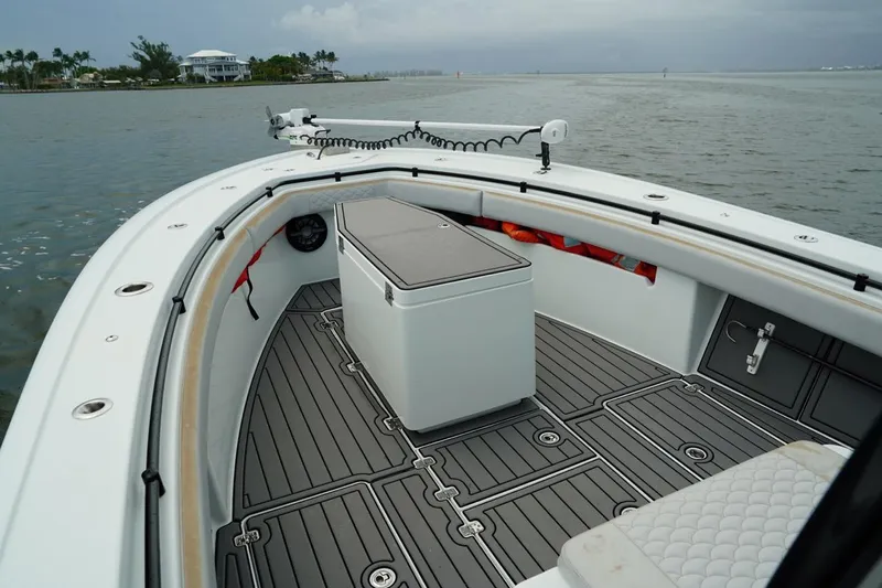  Yacht Photos Pics 2023 Andros 32 Offshore boat with sleek deck design on calm waters.
