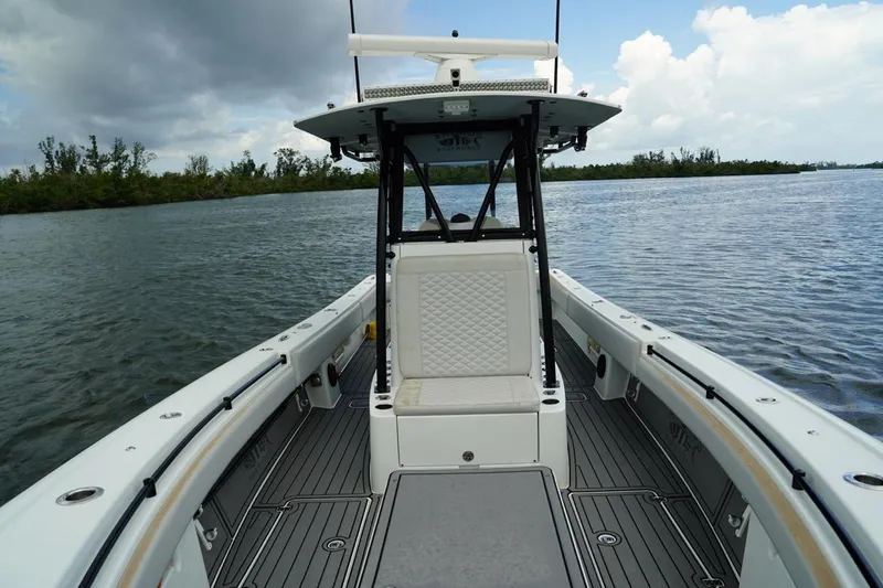  Yacht Photos Pics 2023 Andros 32 Offshore boat on calm water, featuring spacious deck and modern design.