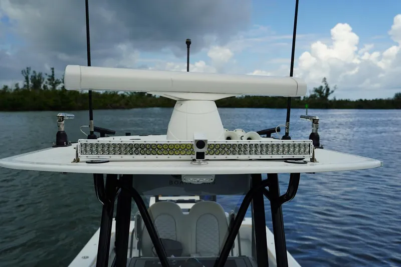  Yacht Photos Pics 2023 Andros 32 Offshore boat with radar and LED light bar on water.