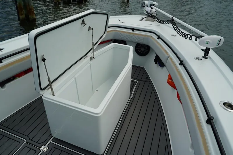  Yacht Photos Pics 2023 Andros 32 Offshore boat with open storage compartment on deck.