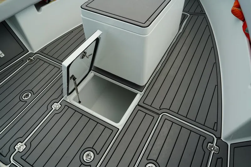  Yacht Photos Pics 2023 Andros 32 Offshore boat deck with open storage compartment.