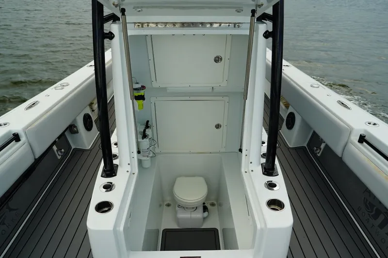  Yacht Photos Pics 2023 Andros 32 Offshore boat with onboard toilet, sleek design, and spacious deck.