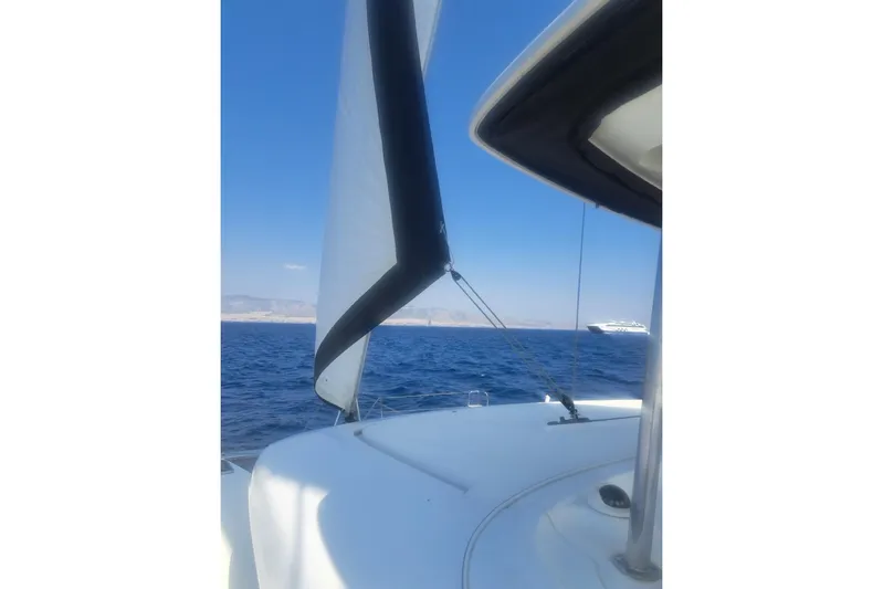  Yacht Photos Pics Sailing on a 2020 Lagoon 42 catamaran with clear blue skies and ocean views.