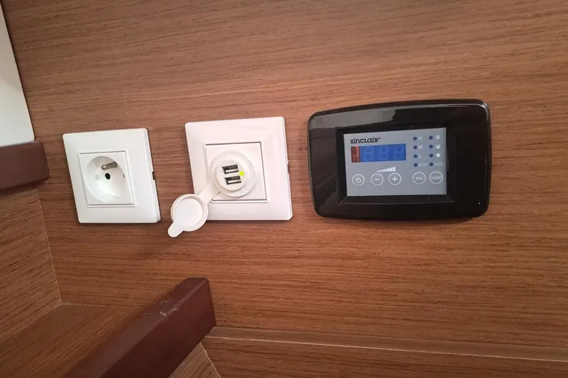  Yacht Photos Pics Power outlets and control panel on 2020 Lagoon 42 yacht interior.