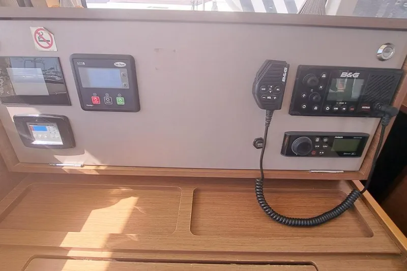  Yacht Photos Pics Control panel of a 2020 Lagoon 42 catamaran with navigation and communication equipment.