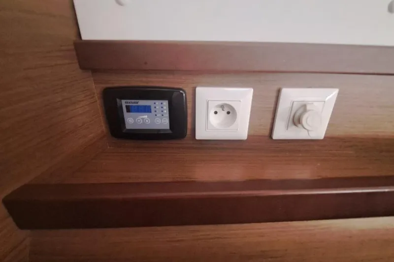  Yacht Photos Pics Control panel and outlets on 2020 Lagoon 42 yacht interior.