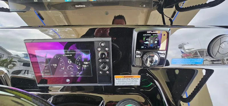  Yacht Photos Pics Dashboard of 2023 Scout 425 LXF boat with Garmin navigation system.
