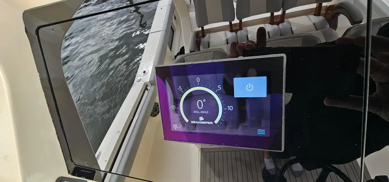  Yacht Photos Pics 2023 Scout 425 LXF boat dashboard with digital display showing roll angle.