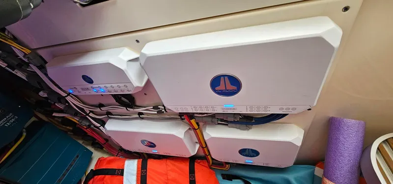  Yacht Photos Pics 2023 Scout 425 LXF boat electronics and safety equipment in storage compartment.