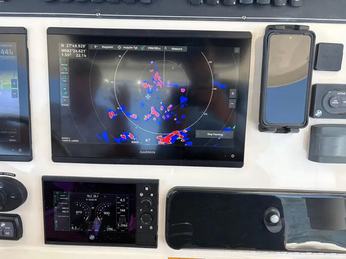  Yacht Photos Pics Control panel of a 2019 Boston Whaler 330 Outrage with navigation and radar displays.