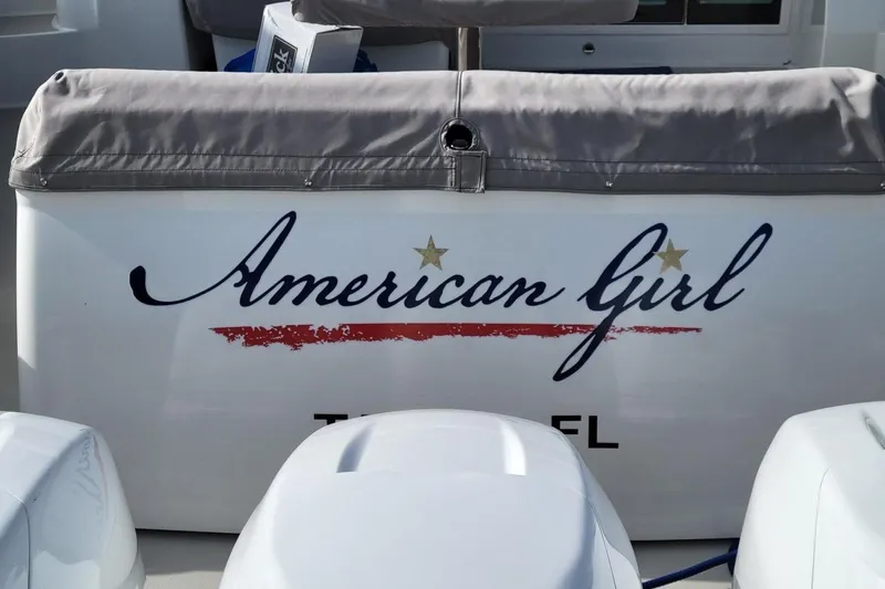 American Girl Yacht Photos Pics Back Cove 390 boat, 2021 model, named "American Girl" with decorative lettering.