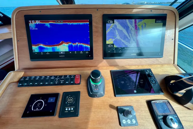 American Girl Yacht Photos Pics Control panel of 2021 Back Cove 390 boat with Garmin navigation displays.