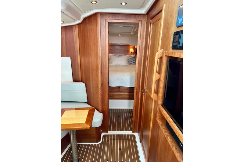 American Girl Yacht Photos Pics Interior of 2021 Back Cove 390 yacht with wood finish and cozy cabin.