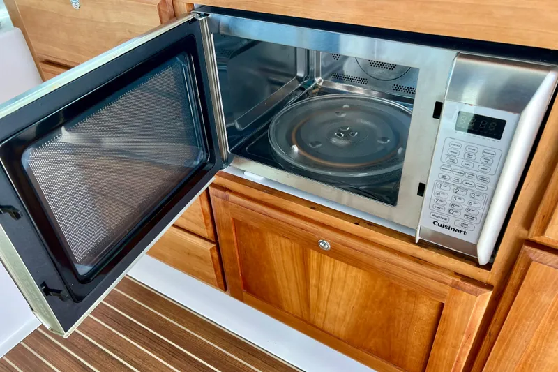 American Girl Yacht Photos Pics Open Cuisinart microwave in 2021 Back Cove 390 yacht kitchen.