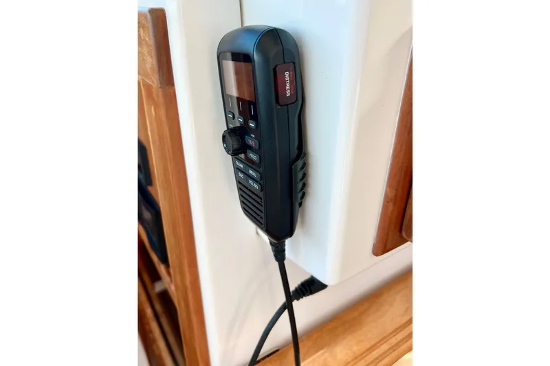 American Girl Yacht Photos Pics VHF radio handset mounted on a 2021 Back Cove 390 boat interior.