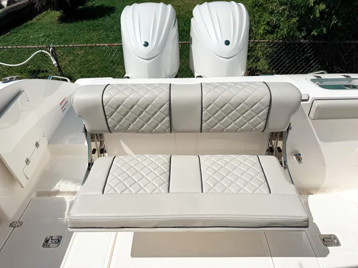  Yacht Photos Pics 2024 Pursuit S 288 Sport boat with luxurious quilted seating and dual engines.