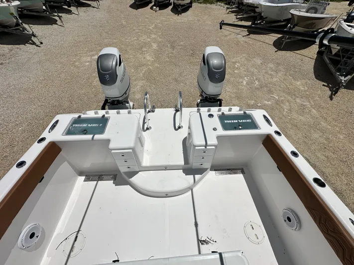  Yacht Photos Pics 2023 Twin Vee 340 GFX CC boat with dual outboard engines, viewed from the rear deck.