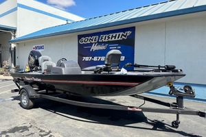 2026 Tracker Bass Tracker Classic XL boat on trailer outside dealership.