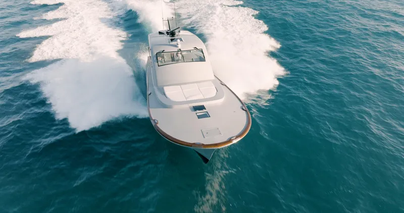  Yacht Photos Pics 2025 Buddy Davis 52 Express yacht cruising on open water.