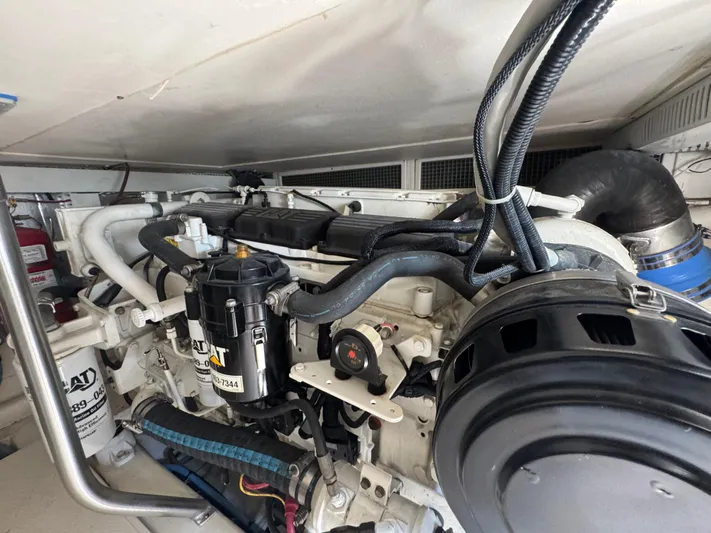  Yacht Photos Pics Engine room of a 2005 Ocean Yachts 50 Super Sport, showcasing detailed mechanical components.