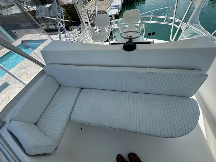  Yacht Photos Pics 2005 Ocean Yachts 50 Super Sport interior with white seating and helm view.