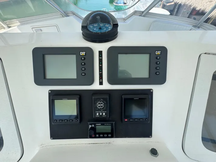  Yacht Photos Pics Control panel of a 2005 Ocean Yachts 50 Super Sport with navigation displays.
