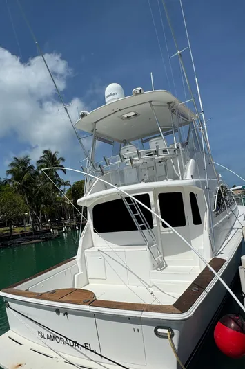  Yacht Photos Pics 2005 Ocean Yachts 50 Super Sport docked in Islamorada, Florida, under clear blue skies.