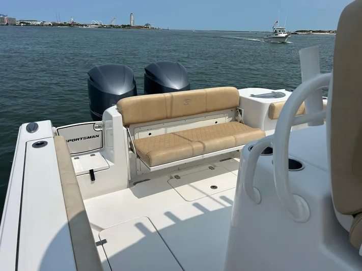  Yacht Photos Pics 2018 Sportsman Open 312 Center Console boat with twin engines on calm water.