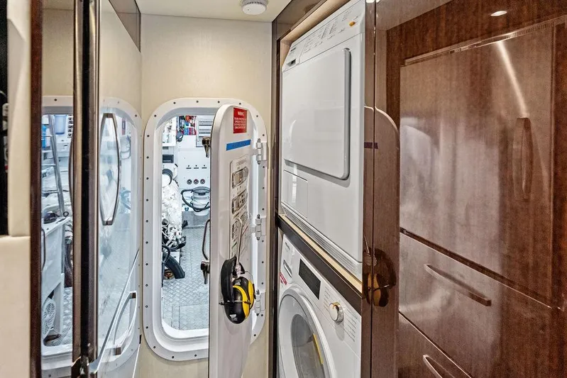 Tempus Fugit Yacht Photos Pics Laundry area and engine room access on 2019 Sunseeker 76 Yacht.