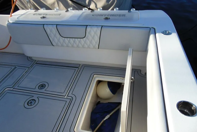 Atlas Yacht Photos Pics 2023 Contender 39 Fisharound boat deck with storage compartment open.