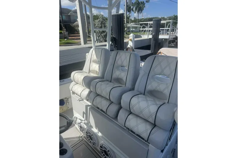 Atlas Yacht Photos Pics Luxurious seating on 2023 Contender 39 Fisharound boat, featuring elegant diamond stitching.