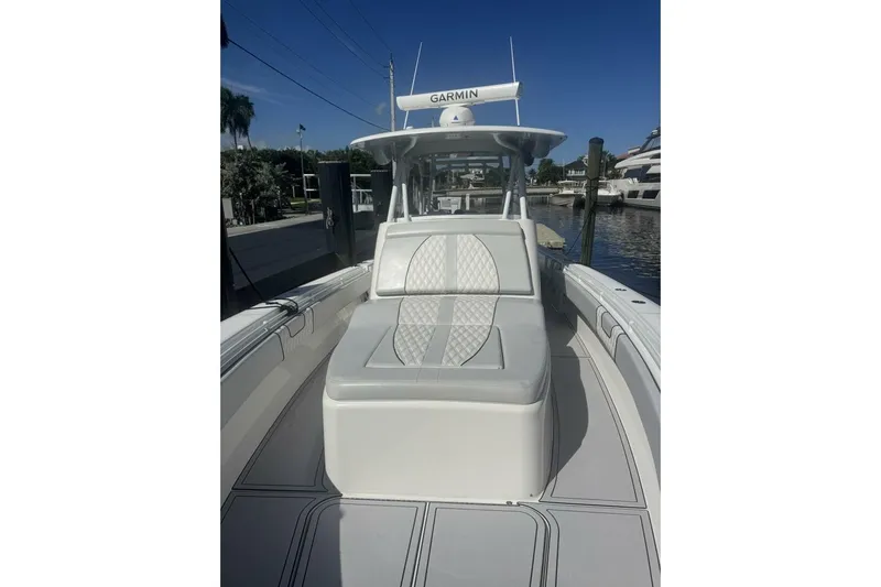 Atlas Yacht Photos Pics 2023 Contender 39 Fisharound boat with cushioned seating and Garmin equipment.