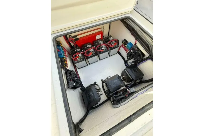 Atlas Yacht Photos Pics Electrical compartment of 2023 Contender 39 Fisharound boat, showcasing battery setup.