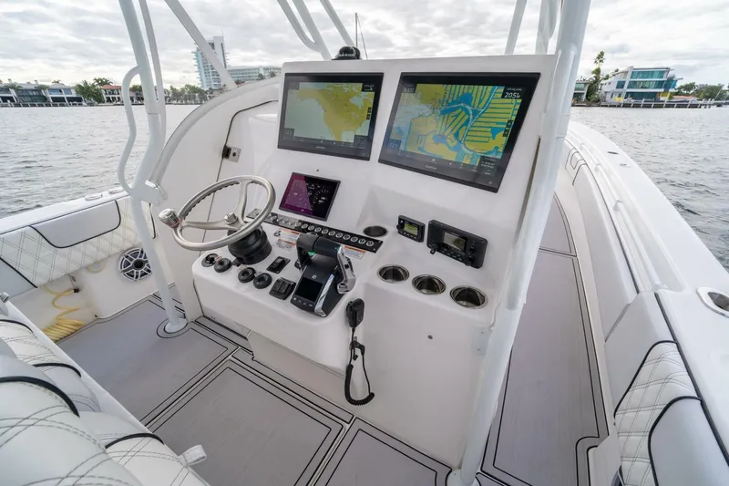 Atlas Yacht Photos Pics Cockpit of 2023 Contender 39 Fisharound with advanced navigation displays and controls.