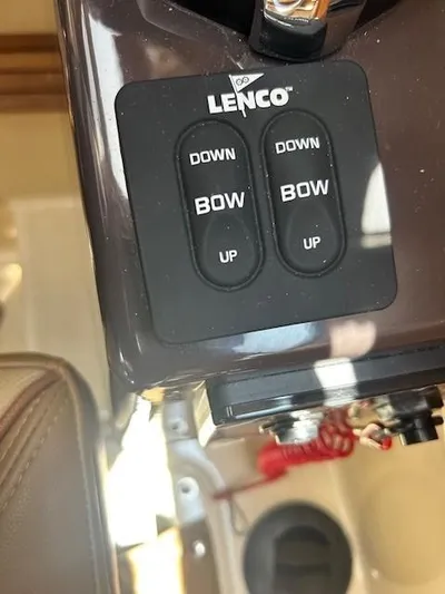  Yacht Photos Pics Control panel of a 2024 Ranger Luxury Edition boat with Lenco trim tab switches.