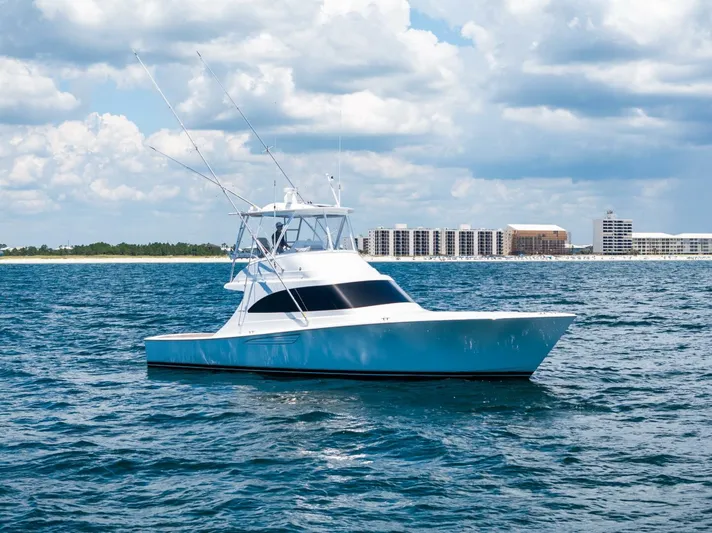 New Viking 46 Billfish Yacht Photos Pics 2026 Viking 46 Billfish yacht on open water with city skyline in background.