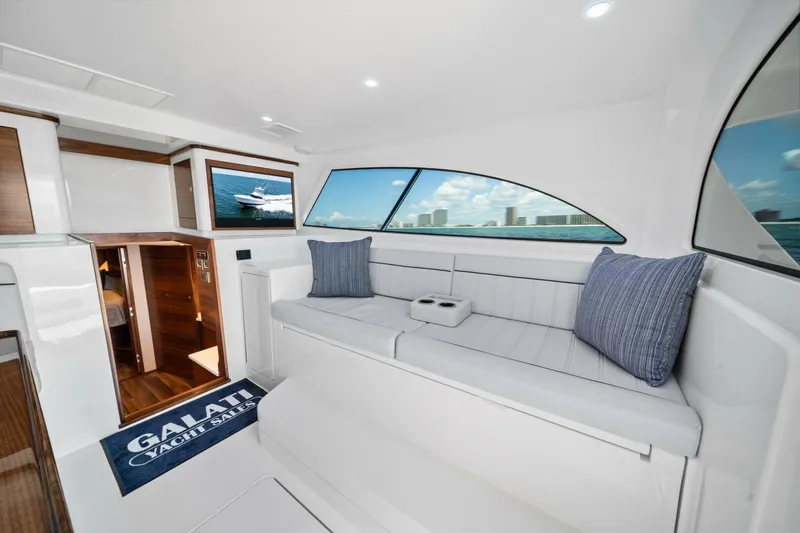 New Viking 46 Billfish Yacht Photos Pics Luxurious interior of 2026 Viking 46 Billfish yacht with plush seating and ocean view.