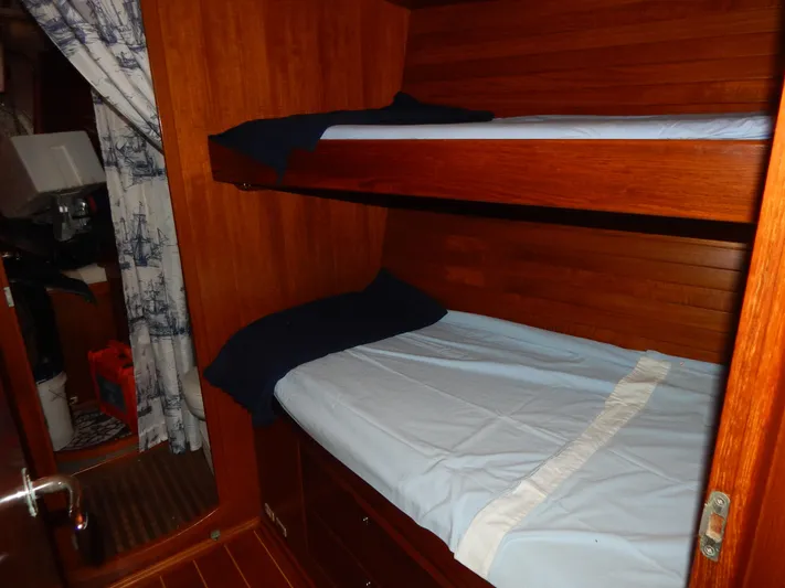 Deep Blue Yacht Photos Pics Interior of a 2002 Northwind sailing yacht with bunk beds.