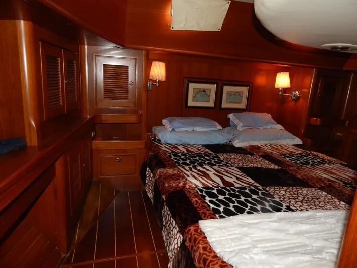 Deep Blue Yacht Photos Pics Luxurious cabin of a 2002 Northwind sailing yacht with wooden interior.