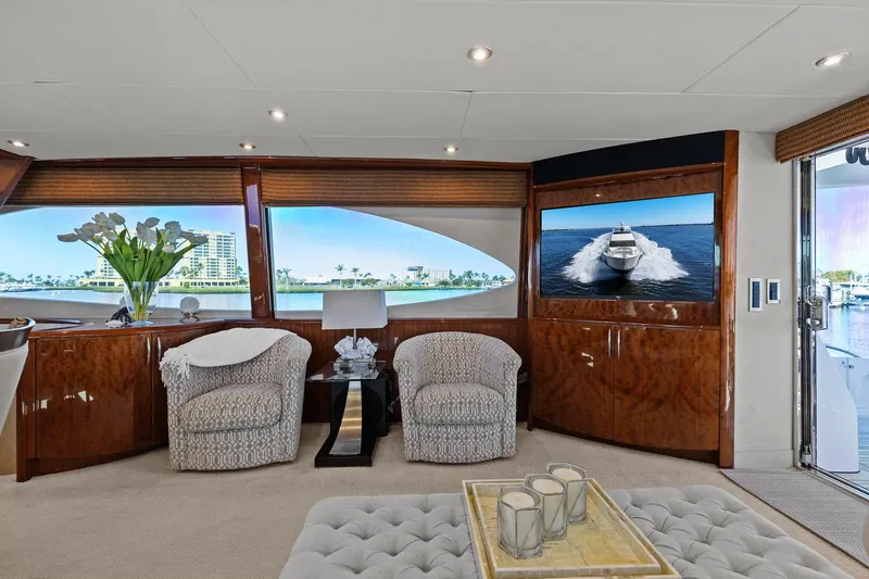  Yacht Photos Pics Luxurious interior of 2005 Lazzara 68 Pilothouse Motoryacht with elegant seating and large windows.