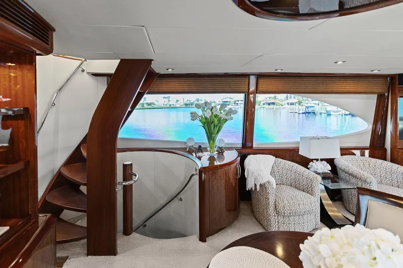  Yacht Photos Pics Luxurious interior of 2005 Lazzara 68 Pilothouse Motoryacht with elegant seating and scenic views.
