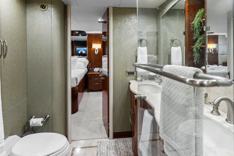  Yacht Photos Pics Luxurious bathroom on 2005 Lazzara 68 Pilothouse Motoryacht with elegant fixtures and modern design.
