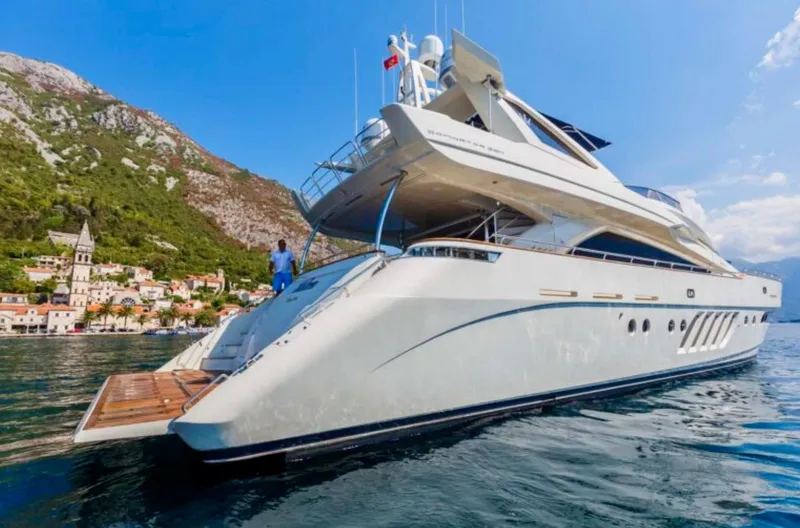 Lady Mura Yacht Photos Pics Luxurious 2010 Dominator 29M yacht docked near scenic coastal village.