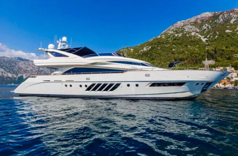 Lady Mura Yacht Photos Pics Luxurious 2010 Dominator 29M yacht cruising near scenic coastline.