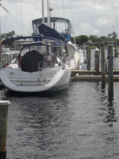Magic Carpet Yacht Photos Pics 2010 Jeanneau Sun Odyssey 36i sailboat docked at marina.