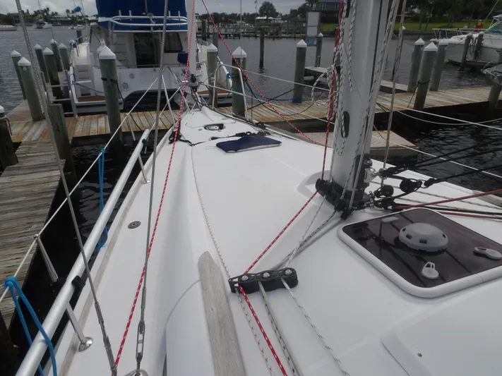 Magic Carpet Yacht Photos Pics Jeanneau Sun Odyssey 36i sailboat docked, showcasing deck and rigging, 2010 model.
